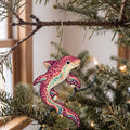 Laser-cut maple wood Zebra Shark folk art ornament O108 hanging on a fir branch, made in USA
