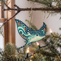 Laser-cut maple wood Spotted Eagle Ray folk art ornament O113 hanging on a fir branch, made in USA