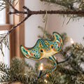Laser-cut maple wood Blue-Spotted Stingray folk art ornament O115 hanging on a fir branch, made in USA