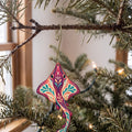 Laser-cut maple wood Guitarfish folk art ornament O116 hanging on a fir branch, made in USA