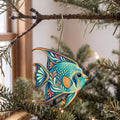 Laser-cut maple wood Queen Angelfish folk art ornament O121 hanging on a fir branch, made in USA