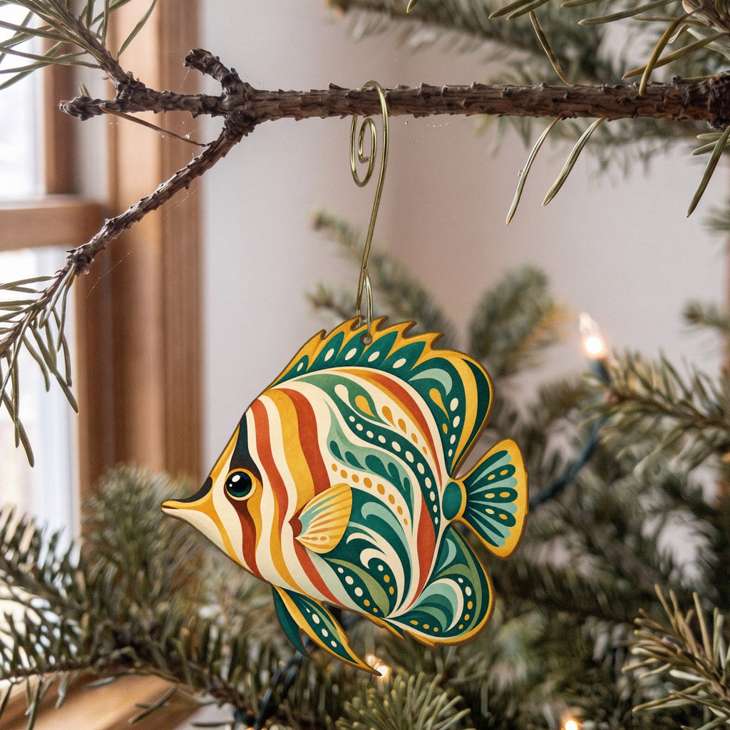 Laser-cut maple wood Butterflyfish folk art ornament O123 hanging on a fir branch, made in USA