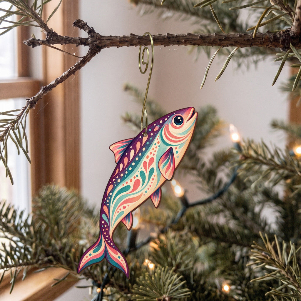 Laser-cut maple wood Sardine folk art ornament O140 hanging on a fir branch, made in USA