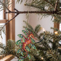 Laser-cut maple wood Leafy Seadragon folk art ornament O150 hanging on a fir branch, made in USA
