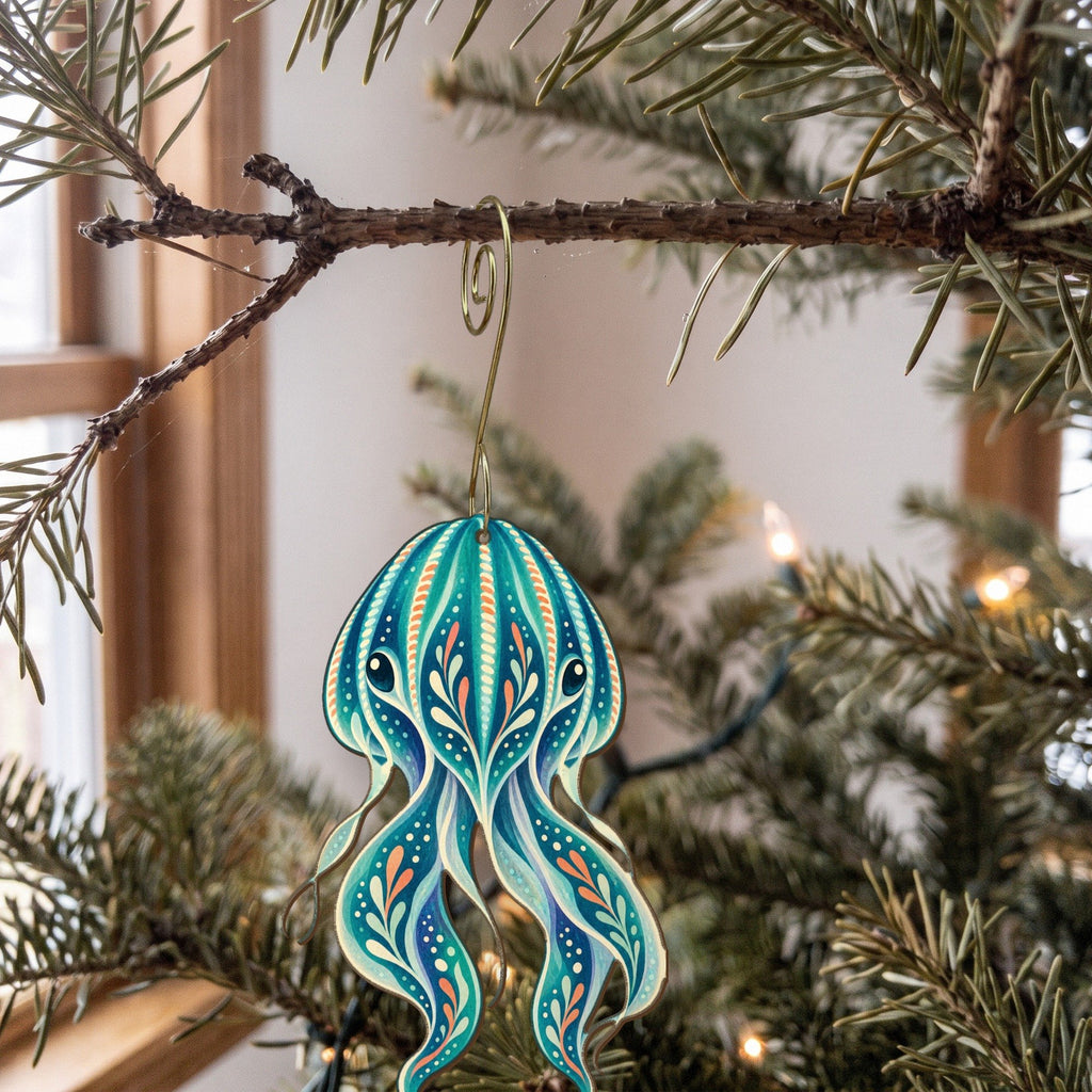 Laser-cut maple wood Comb Jelly folk art ornament O161 hanging on a fir branch, made in USA