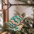 Laser-cut maple wood Abalone folk art ornament O175 hanging on a fir branch, made in USA