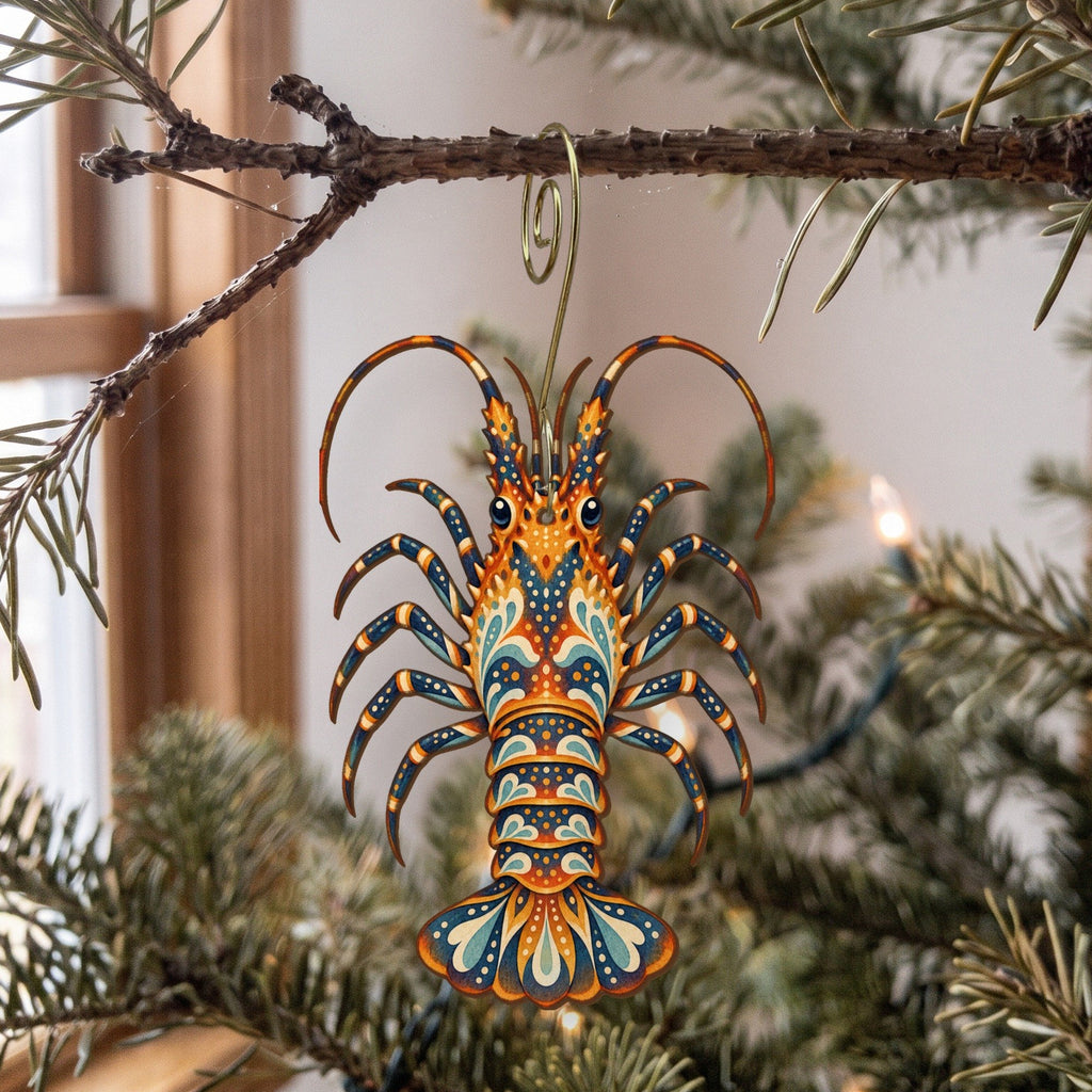 Laser-cut maple wood Spiny Lobster folk art ornament O178 hanging on a fir branch, made in USA