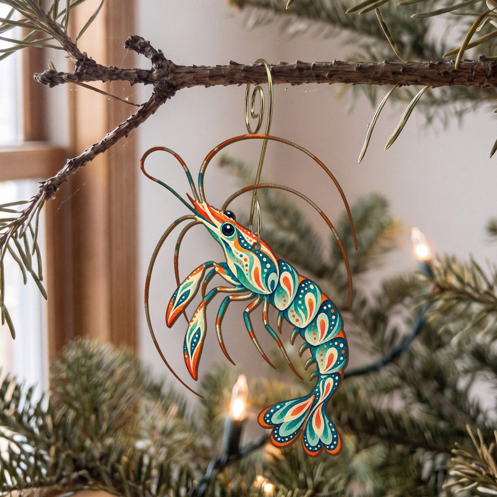 Laser-cut maple wood Cleaner Shrimp folk art ornament O185 hanging on a fir branch, made in USA