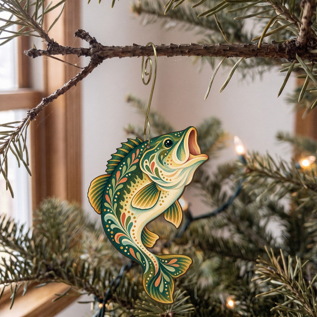 Laser-cut maple wood Largemouth Bass folk art ornament O187 hanging on a fir branch, made in USA