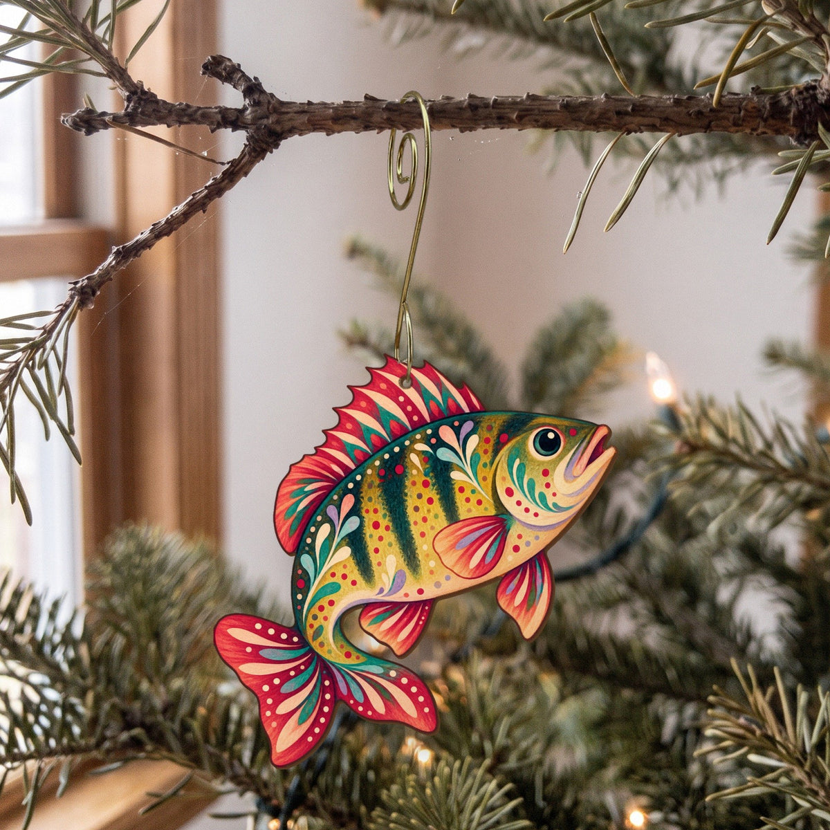 Laser-cut maple wood Yellow Perch folk art ornament O192 hanging on a fir branch, made in USA