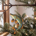 Laser-cut maple wood Northern Pike folk art ornament O194 hanging on a fir branch, made in USA