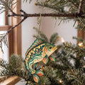 Laser-cut maple wood Mirror Carp folk art ornament O203 hanging on a fir branch, made in USA