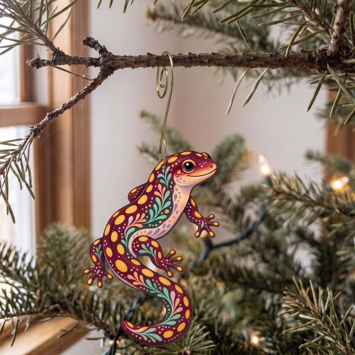 Laser-cut maple wood Spotted Salamander folk art ornament O222 hanging on a fir branch, made in USA