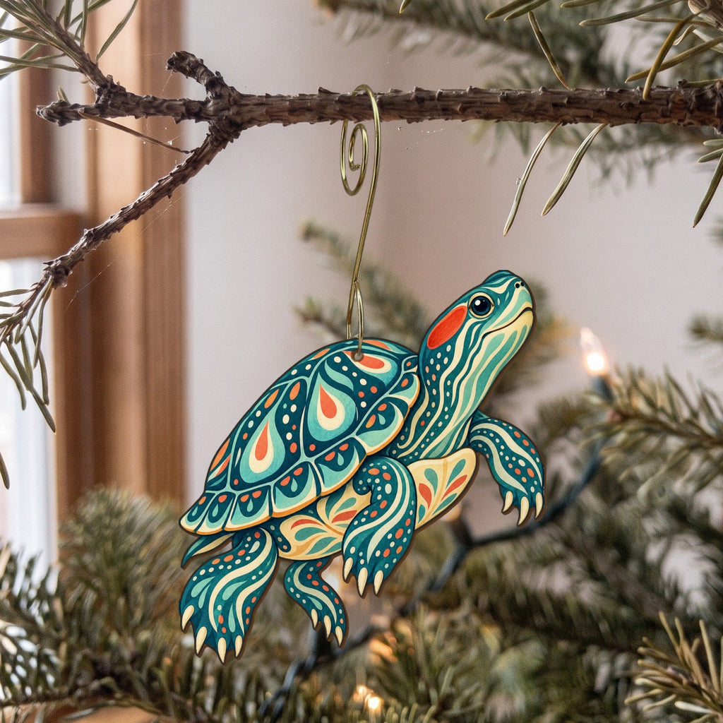 Laser-cut maple wood Red-Eared Slider folk art ornament O225 hanging on a fir branch, made in USA
