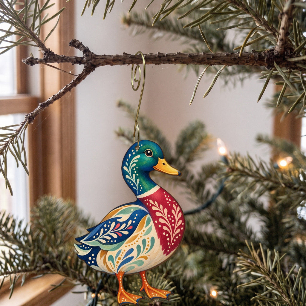 Laser-cut maple wood Mallard Duck folk art ornament O229 hanging on a fir branch, made in USA