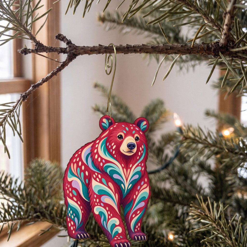 Laser-cut maple wood American Black Bear folk art ornament O248 hanging on a fir branch, made in USA