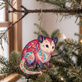 Laser-cut maple wood Virginia Opossum folk art ornament O272 hanging on a fir branch, made in USA