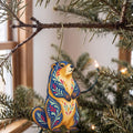 Laser-cut maple wood Yellow-Bellied Marmot folk art ornament O277 hanging on a fir branch, made in USA