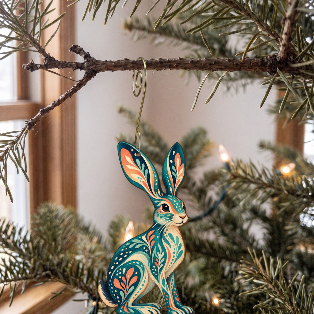 Laser-cut maple wood Black-Tailed Jackrabbit folk art ornament O281 hanging on a fir branch, made in USA