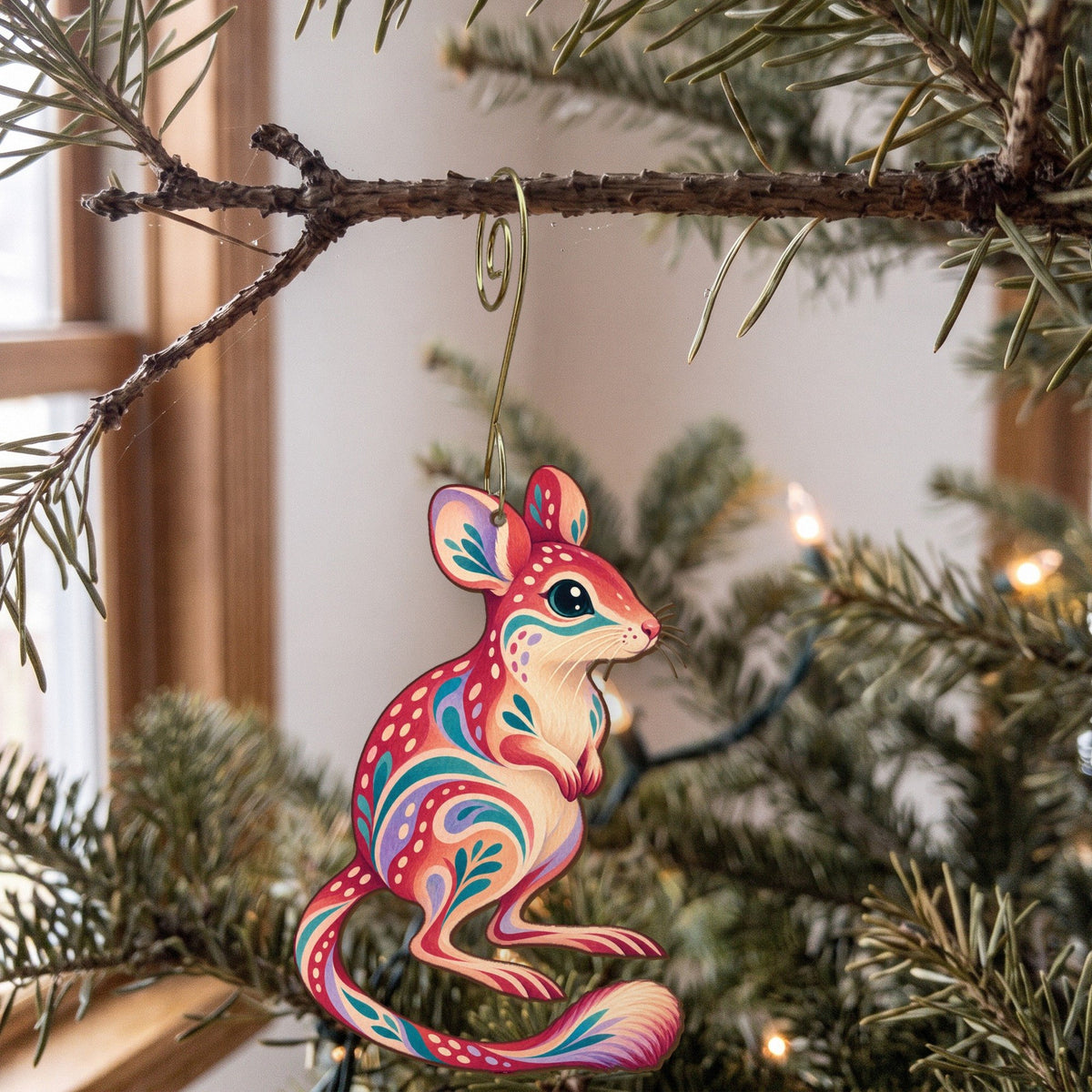 Laser-cut maple wood Kangaroo Rat folk art ornament O288 hanging on a fir branch, made in USA