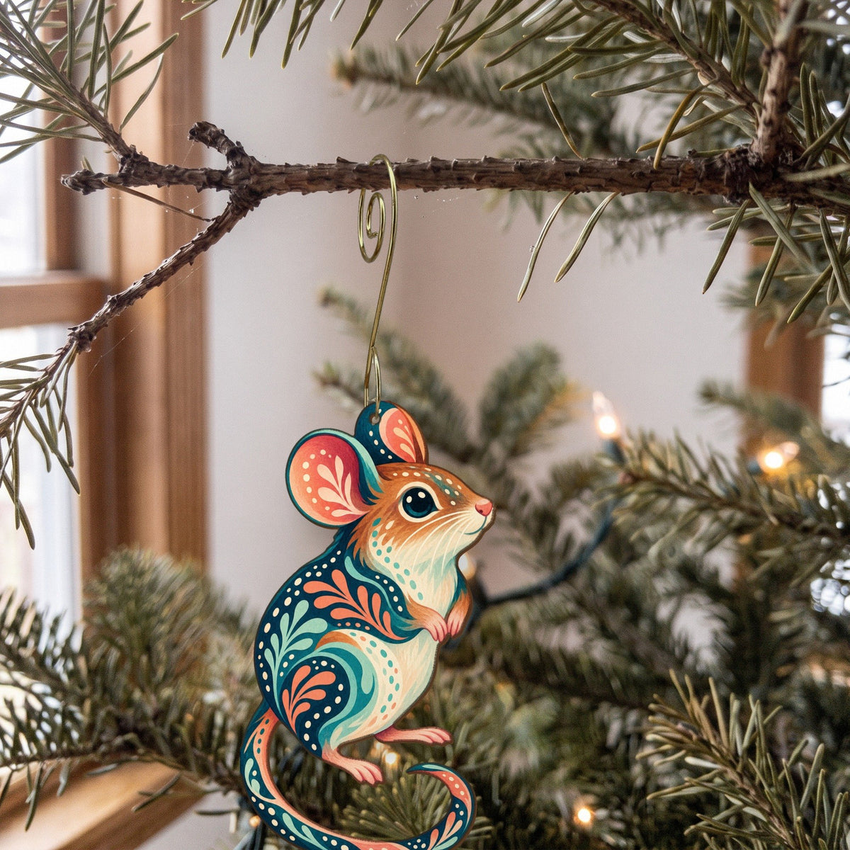 Laser-cut maple wood Deer Mouse folk art ornament O289 hanging on a fir branch, made in USA