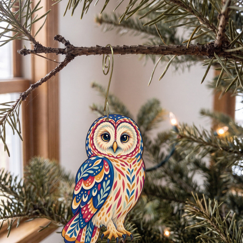 Laser-cut maple wood Barred Owl folk art ornament O301 hanging on a fir branch, made in USA