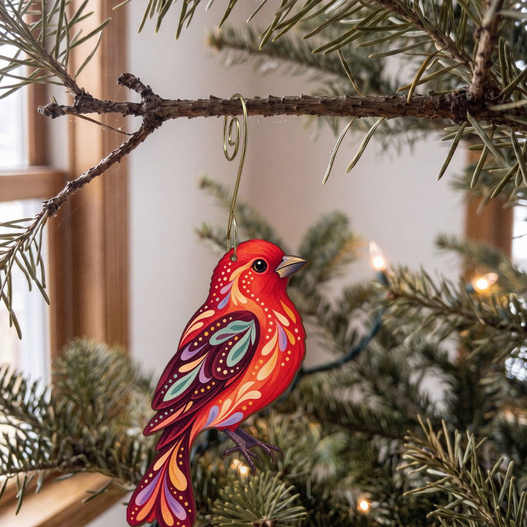 Laser-cut maple wood Scarlet Tanager folk art ornament O310 hanging on a fir branch, made in USA