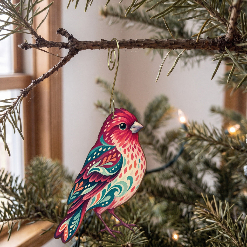Laser-cut maple wood Purple Finch folk art ornament O313 hanging on a fir branch, made in USA