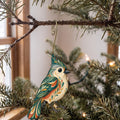 Laser-cut maple wood Tufted Titmouse folk art ornament O315 hanging on a fir branch, made in USA