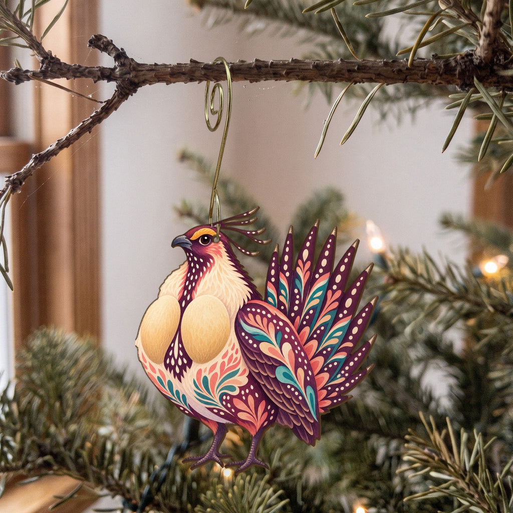 Laser-cut maple wood Greater Sage-Grouse folk art ornament O324 hanging on a fir branch, made in USA