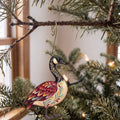 Laser-cut maple wood Canada Goose folk art ornament O326 hanging on a fir branch, made in USA