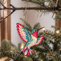 Laser-cut maple wood Ruby-Throated Hummingbird folk art ornament O328 hanging on a fir branch, made in USA