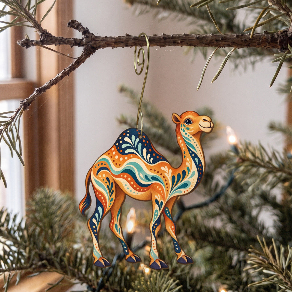 Laser-cut maple wood Dromedary Camel folk art ornament O378 hanging on a fir branch, made in USA
