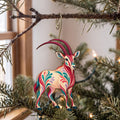 Laser-cut maple wood Scimitar-Horned Oryx folk art ornament O384 hanging on a fir branch, made in USA