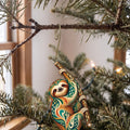 Laser-cut maple wood Two-Toed Sloth folk art ornament O403 hanging on a fir branch, made in USA