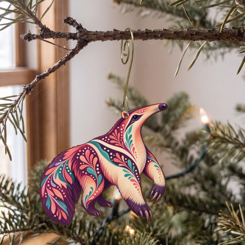 Laser-cut maple wood Giant Anteater folk art ornament O404 hanging on a fir branch, made in USA