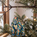 Laser-cut maple wood Western Lowland Gorilla folk art ornament O415 hanging on a fir branch, made in USA