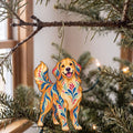 Laser-cut maple wood Golden Retriever folk art ornament O437 hanging on a fir branch, made in USA