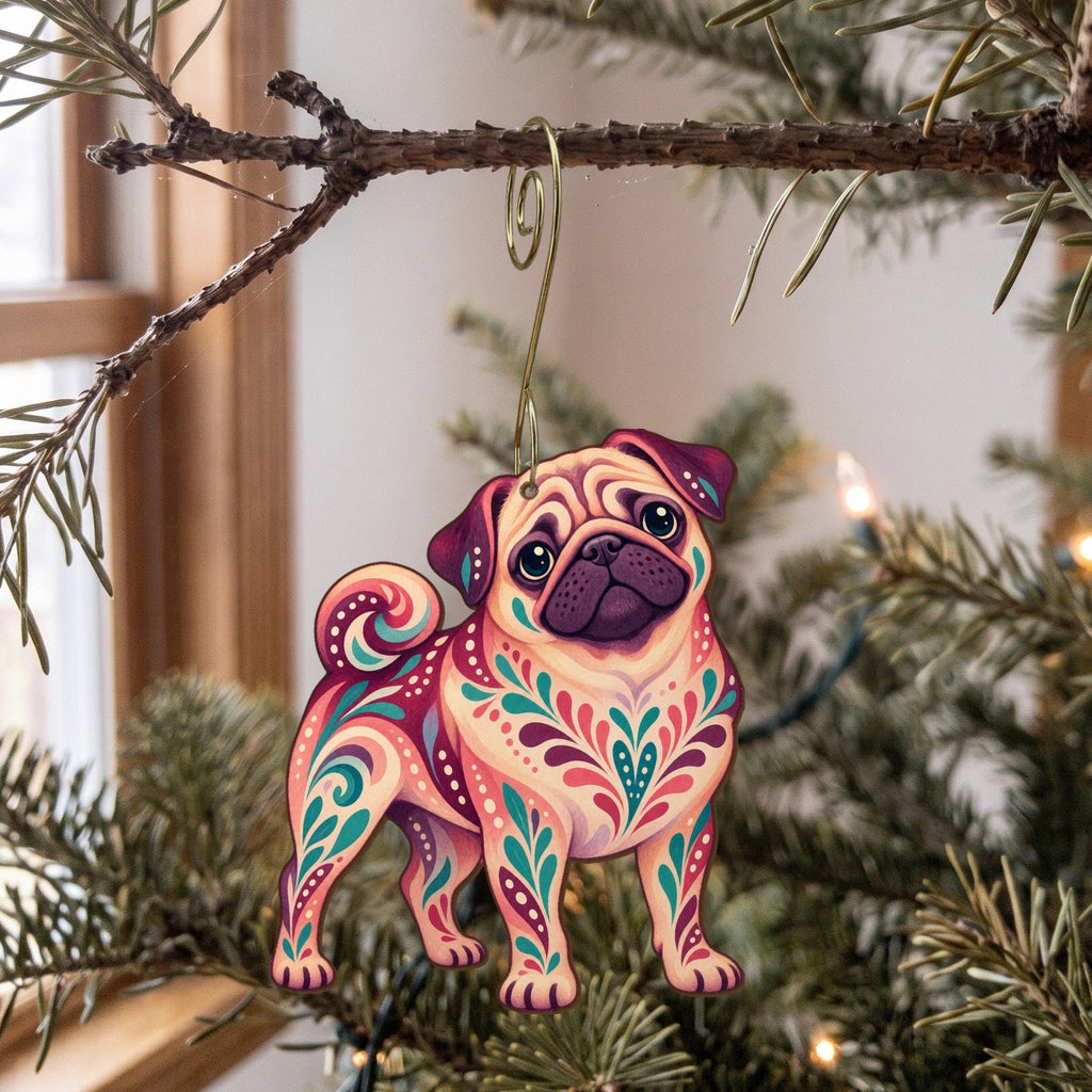 Laser-cut maple wood Pug folk art ornament O444 hanging on a fir branch, made in USA