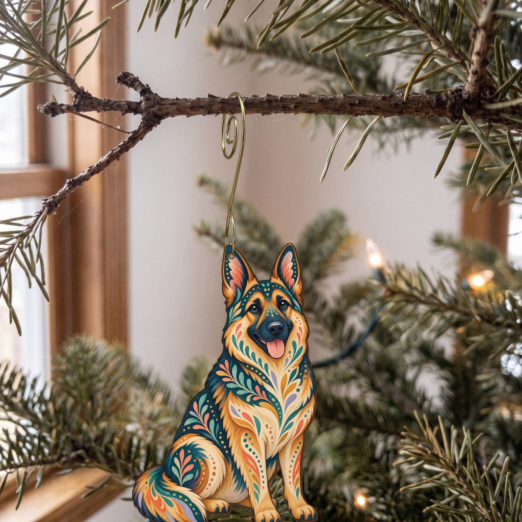Laser-cut maple wood German Shepherd folk art ornament O447 hanging on a fir branch, made in USA