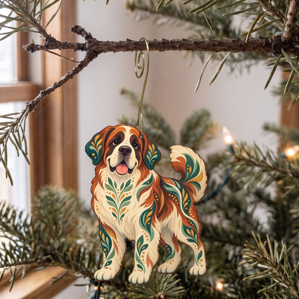 Laser-cut maple wood Saint Bernard folk art ornament O451 hanging on a fir branch, made in USA
