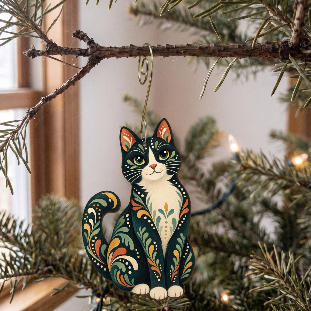 Laser-cut maple wood Tuxedo Cat folk art ornament O459 hanging on a fir branch, made in USA