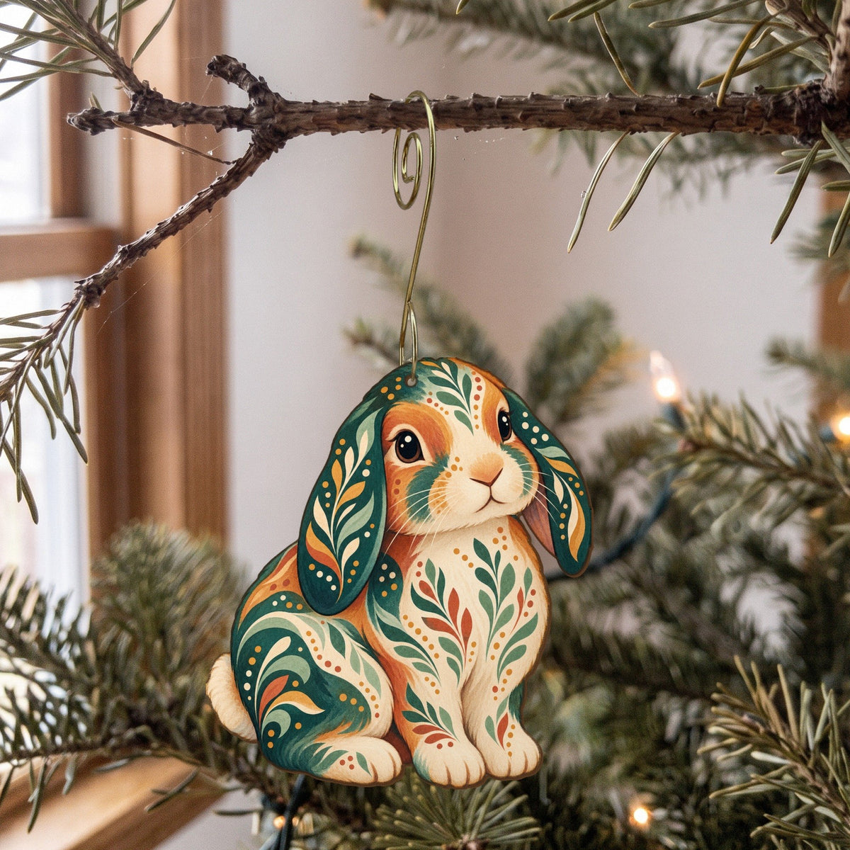 Laser-cut maple wood Holland Lop Rabbit folk art ornament O467 hanging on a fir branch, made in USA