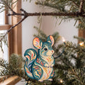 Laser-cut maple wood Chinchilla folk art ornament O471 hanging on a fir branch, made in USA