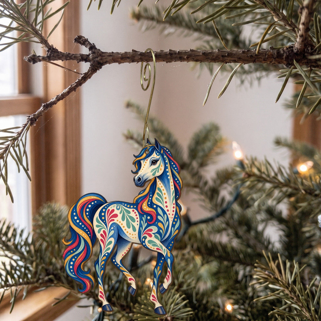 Laser-cut maple wood Arabian Horse folk art ornament O477 hanging on a fir branch, made in USA