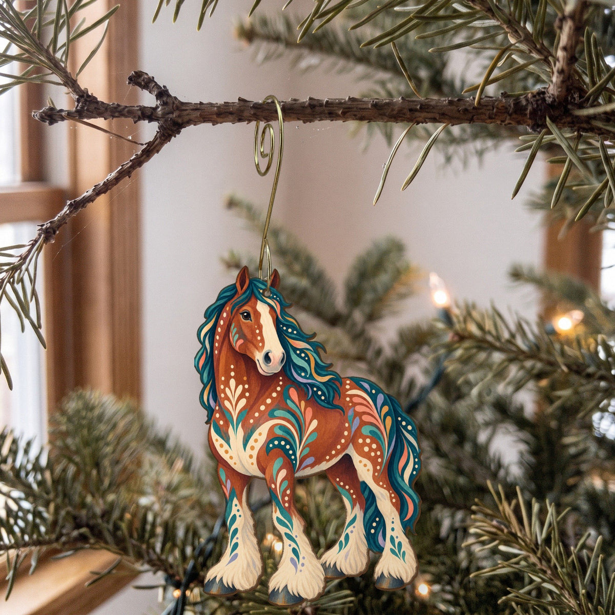 Laser-cut maple wood Clydesdale Horse folk art ornament O479 hanging on a fir branch, made in USA