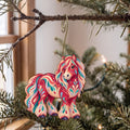 Laser-cut maple wood Shetland Pony folk art ornament O480 hanging on a fir branch, made in USA