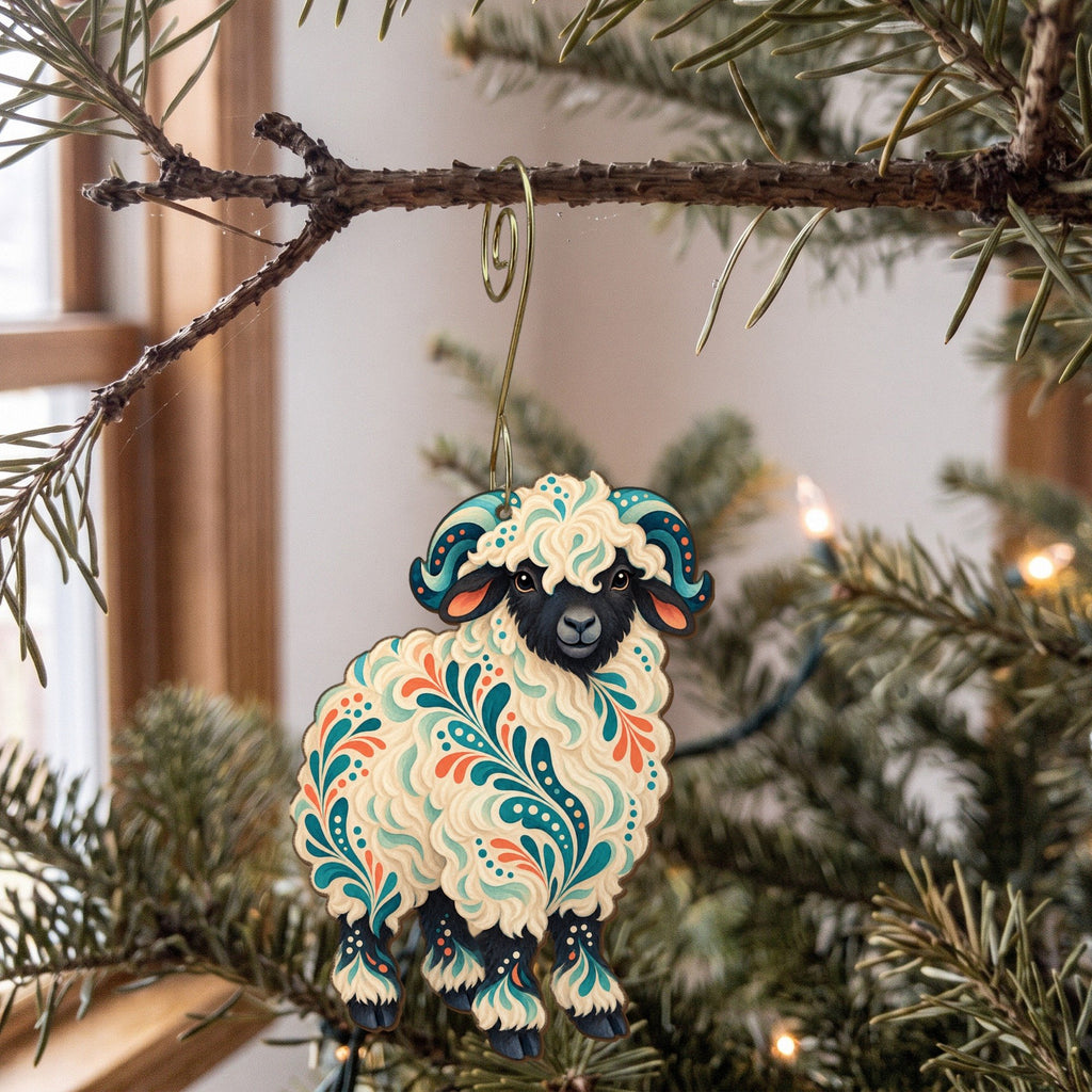 Laser-cut maple wood Valais Blacknose Sheep folk art ornament O489 hanging on a fir branch, made in USA