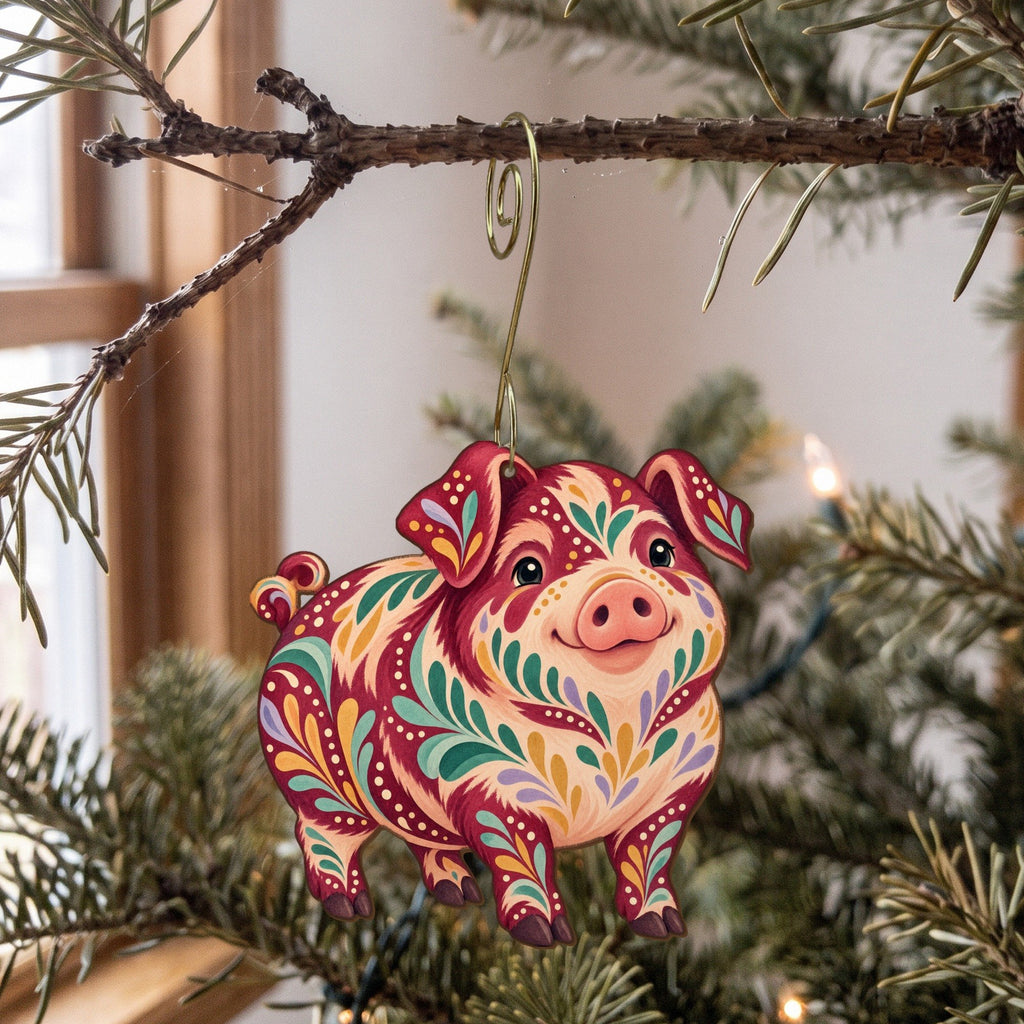 Laser-cut maple wood Kunekune Pig folk art ornament O494 hanging on a fir branch, made in USA