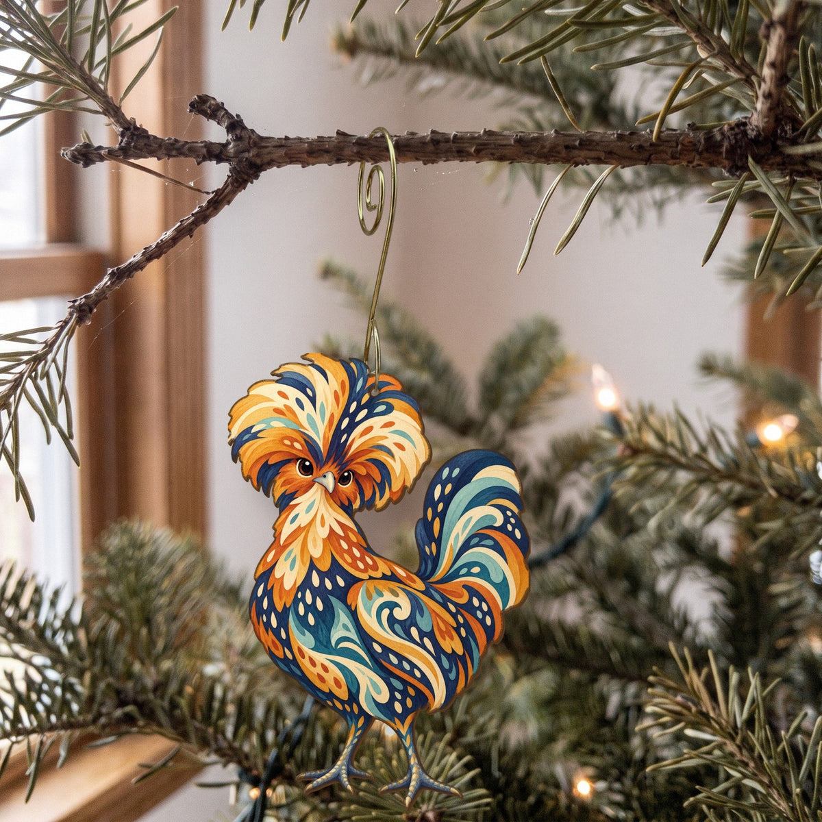Laser-cut maple wood Polish Crested Chicken folk art ornament O498 hanging on a fir branch, made in USA